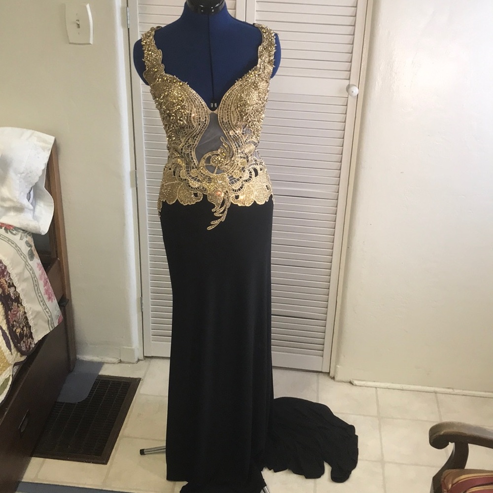 Gorgeous unique black and gold gown
